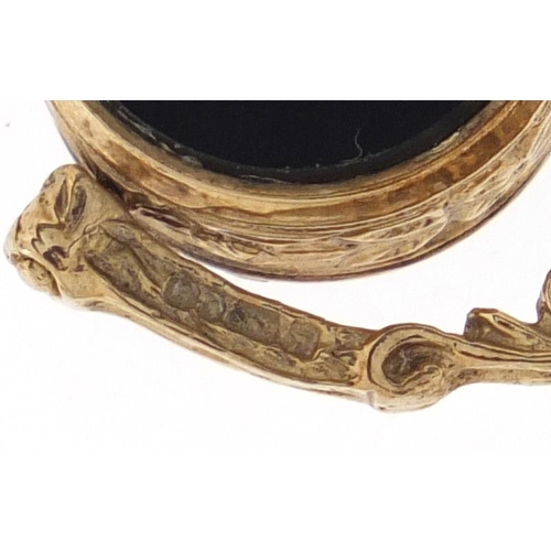 2908 - Victorian gold coloured metal hardstone spinner fob, 2.5cm in length, approximate weight 5.7g