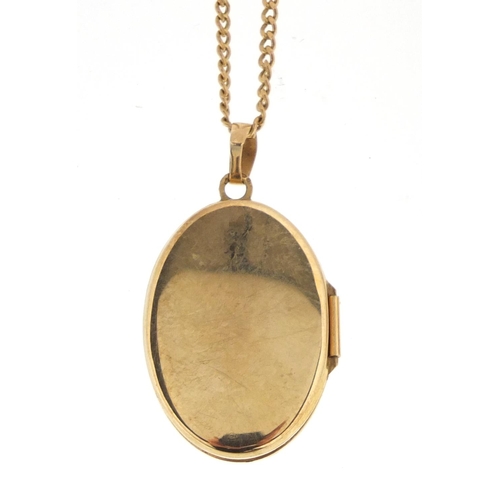 2899 - 9ct gold locket on 9ct gold necklace and a 9ct gold signet ring, size S, approximate weight 8.3g