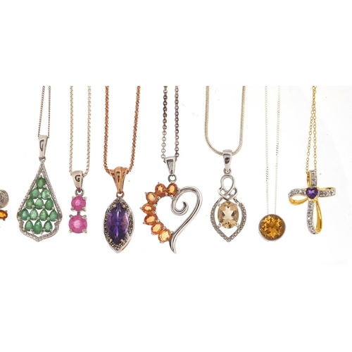 2898 - Ten silver semi precious stone pendants on silver necklaces, approximate weight 37.8g