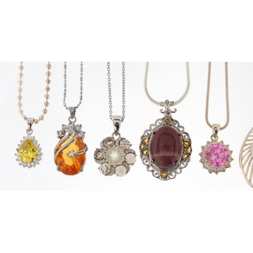 3026 - Ten silver semi precious stone pendants, eight with silver necklaces, approximate weight 62.5g