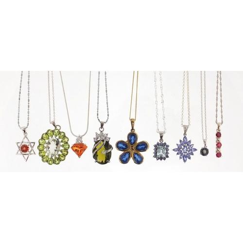 3058 - Ten silver semi precious stone pendants with silver necklaces, approximate weight 41.2g