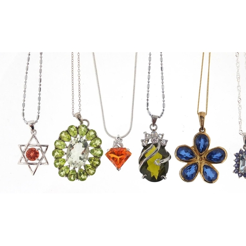 3058 - Ten silver semi precious stone pendants with silver necklaces, approximate weight 41.2g