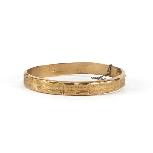 2907 - 9ct gold bangle, 6.5cm in diameter, approximate weight 10.8g