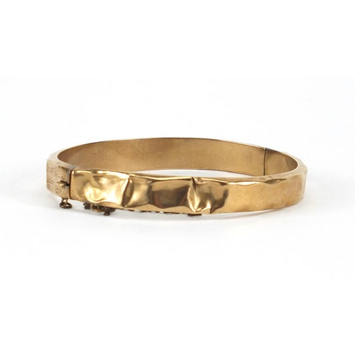 2907 - 9ct gold bangle, 6.5cm in diameter, approximate weight 10.8g
