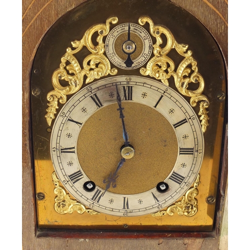 2460 - Edwardian mahogany Lancet bracket clock striking on two gongs with twin handles, the silvered dials ... 