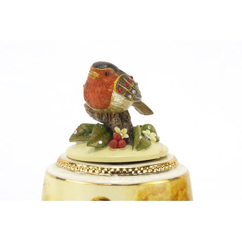 2576 - Two Bradex tranquil garden musical birds, the largest 13cm high