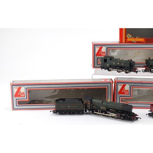 2640 - OO gauge model railway with boxes comprising two Lima locomotives, Hornby locomotive and two Lima ad... 