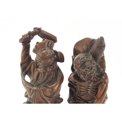 2180 - Two good Chinese root carvings including one of a warrior, the largest 28cm high