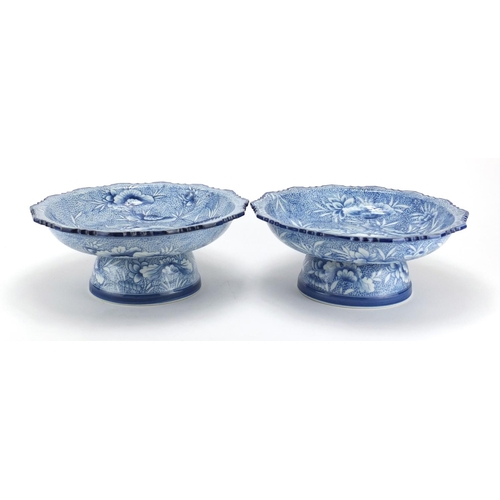 2483 - Near pair of Japanese blue and white porcelain pedestal dishes, hand painted with flowers, each 12.5... 