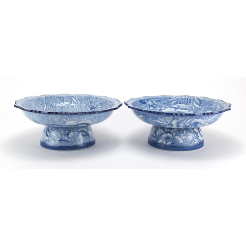 2483 - Near pair of Japanese blue and white porcelain pedestal dishes, hand painted with flowers, each 12.5... 