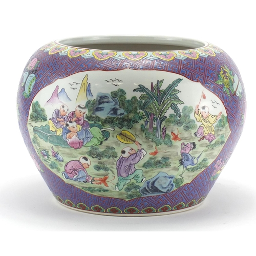 2228 - Large Chinese porcelain fish bowl, finely hand painted in the famille rose palette with panels of bi... 