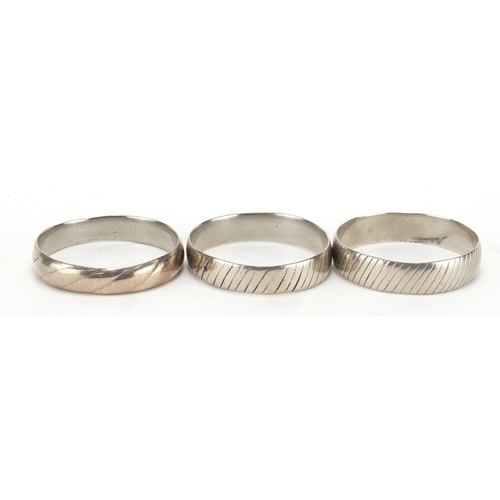 2786 - Three silver coloured metal Bedouin tribal bangles, each approximately 6.7cm in diameter