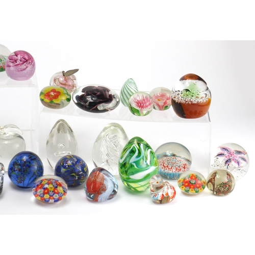 2166 - Collection of mostly colourful glass paperweights including Caithness, Strathearn and Mdina, the lar... 