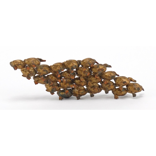 2285 - Painted bronze flock of ducks, 22cm in length