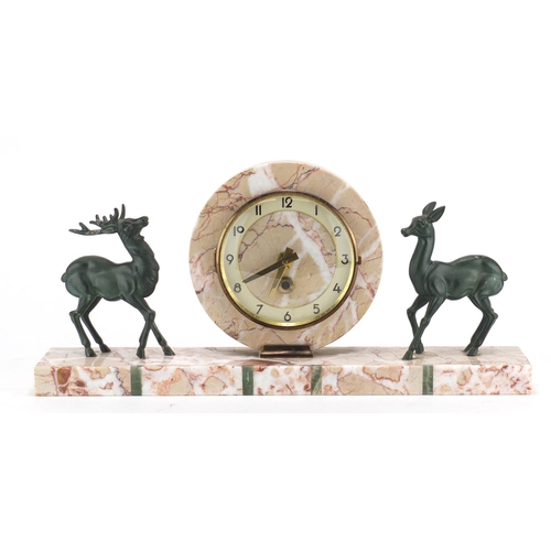 2343 - Art Deco marble and onyx mantel clock, mounted with two bronzed deer's, the dial with Arabic numeral... 
