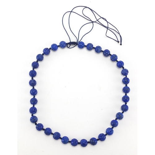 3065 - Chinese carved lapis lazuli bead necklace, 46cm in length, approximate weight 77.6g