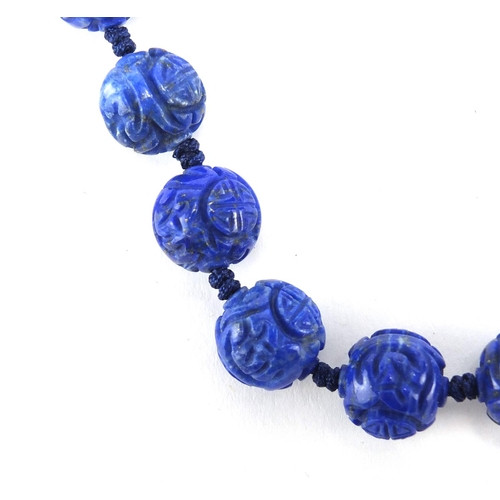 3065 - Chinese carved lapis lazuli bead necklace, 46cm in length, approximate weight 77.6g