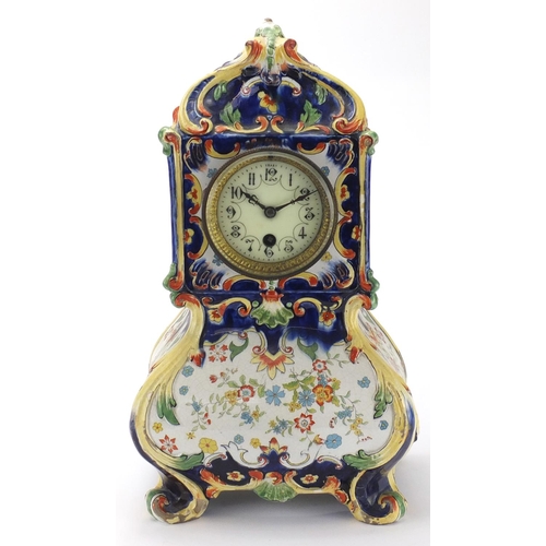 2464 - French Quimper pottery mantel clock, decorated with stylised flowers, the enamelled dial with Arabic... 