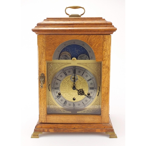 2182 - Oak cased Westminster chiming bracket clock, the movement stamped Kieninger striking on nine bells w... 
