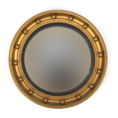 2099 - Circular gilt framed convex mirror, 41cm in diameter