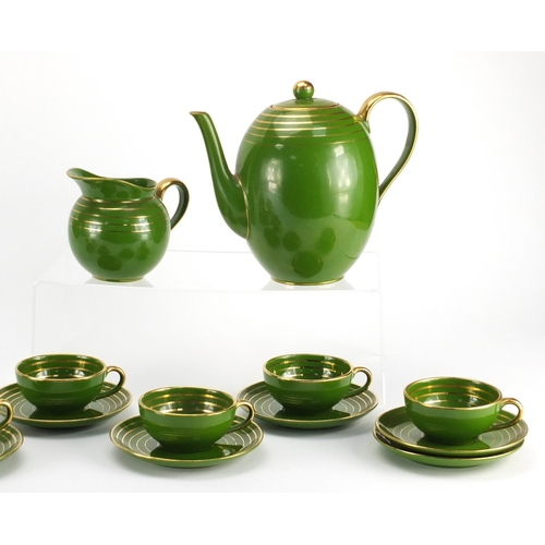 2486 - Vintage Italian green and gilt coffee service by Richard Ginori, the coffee pot 18cm high