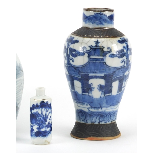 2381 - Chinese ceramics and a carved hardwood stand including a blue and white snuff bottle and a baluster ... 