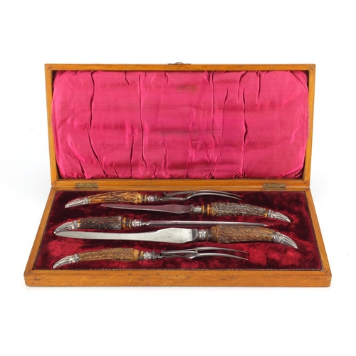 2363 - Victorian five piece horn handled carving set with silver mounts and steel blades, housed in a fitte... 