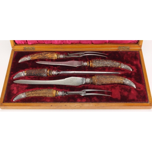 2363 - Victorian five piece horn handled carving set with silver mounts and steel blades, housed in a fitte... 