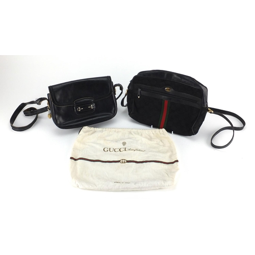 2695 - Two vintage Gucci handbags including a monogramed canvas example, one with dust bag, the largest 26c... 