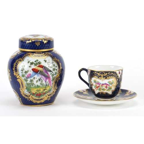 2547 - Royal Worcester blue scale cup and saucer and a similar vase and cover, both hand painted with exoti... 