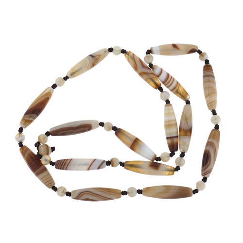 2912 - Islamic agate elongated bead necklace, 60cm in length