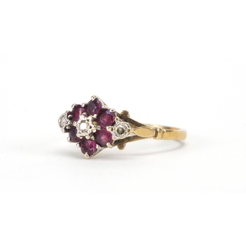 2921 - 9ct gold diamond and pink stone flower head ring, size N, approximate weight 3.0g