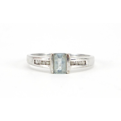 3081 - 9ct white gold blue stone ring with diamond shoulders, size P, approximate weight 2.5g