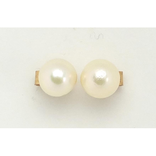 3035 - Pair of 9c gold pearl earrings, approximate weight 0.6g