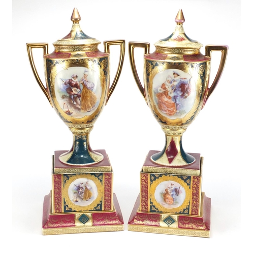 2542 - Large pair of Austrian Vienna style porcelain vases and covers with twin handles, each decorated wit... 