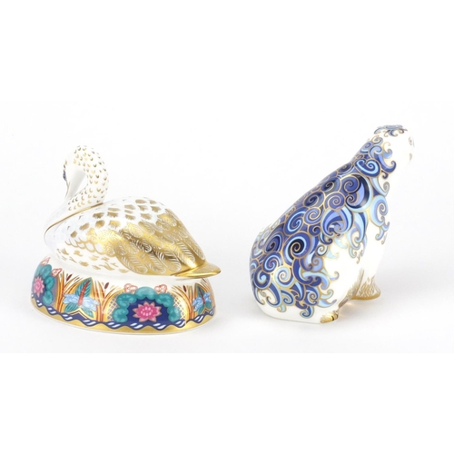 2527 - Two Royal Crown Derby paperweights with stoppers comprising polar bear and swan, the largest 10.5cm ... 