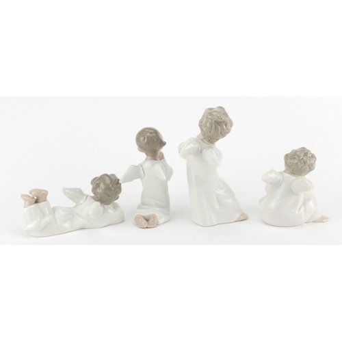 2624 - Four Lladro cherub figures, the largest 16cm high