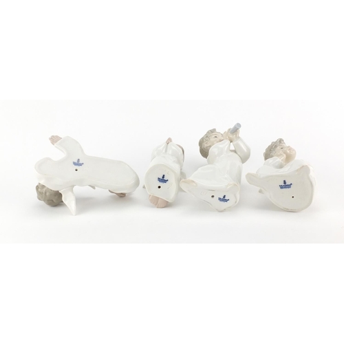 2624 - Four Lladro cherub figures, the largest 16cm high