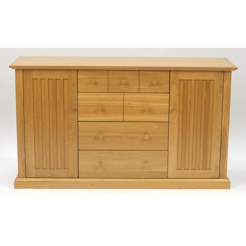 2025 - Contemporary light oak sideboard fitted with four drawers and a pair of cupboard doors, 85.5cm H x 1... 