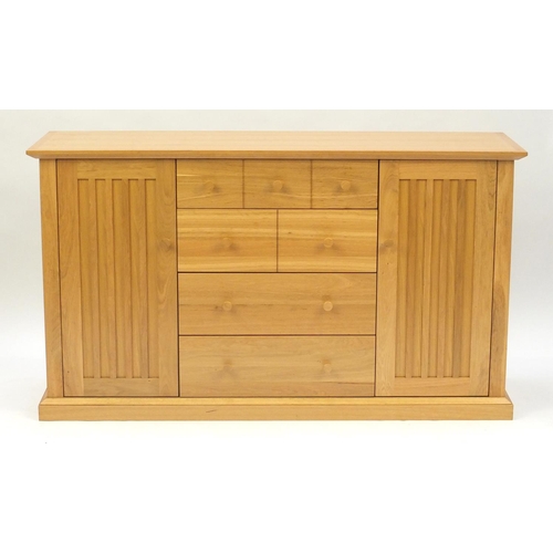 2025 - Contemporary light oak sideboard fitted with four drawers and a pair of cupboard doors, 85.5cm H x 1... 