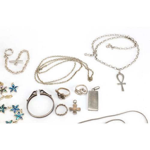 3040 - Silver and white metal jewellery including bracelets,  Ingot pendant, bracelets and rings, approxima... 