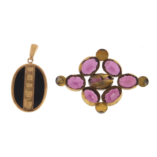 3023 - 9ct gold black onyx pendant and a Victorian gilt metal amethyst brooch, the pendant 2.7cm in length