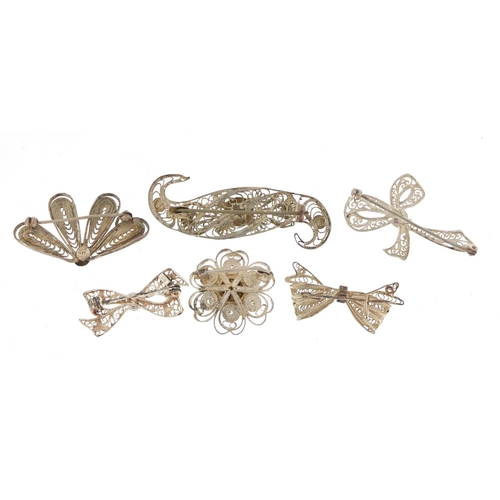 3079 - Six silver filigree brooches, the largest 5.5cm in length, approximate weight 22.8g