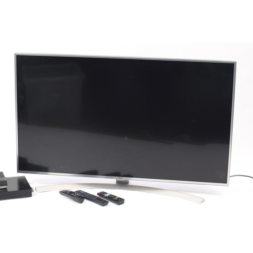 2058 - LG 49inch LED television, LG Ultra HD DVD player and a BT you view box, with remote controls