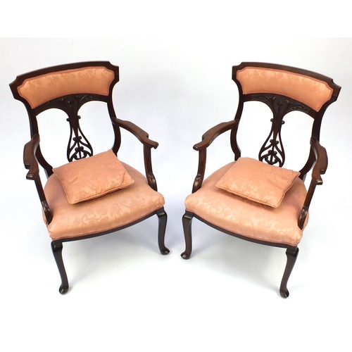 2046 - Pair of Edwardian Art Nouveau mahogany salon chairs floral motif and salmon upholstery, 96cm high