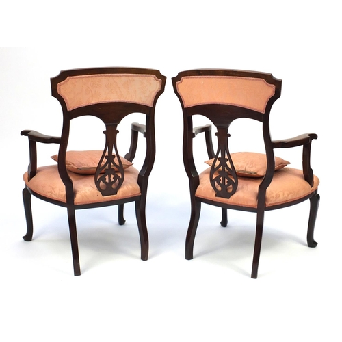 2046 - Pair of Edwardian Art Nouveau mahogany salon chairs floral motif and salmon upholstery, 96cm high