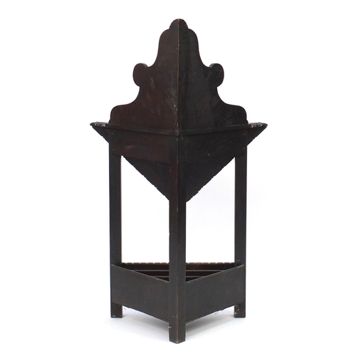 2070 - Antique oak drop leaf corner stand with magazine rack to the base, 130cm h x 76cm W x 54cm D