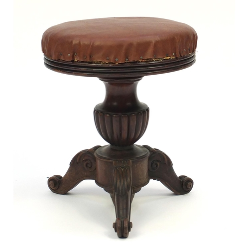 2071 - Victorian carved mahogany adjustable piano stool, with brown leather top and scroll feet, 48cm high