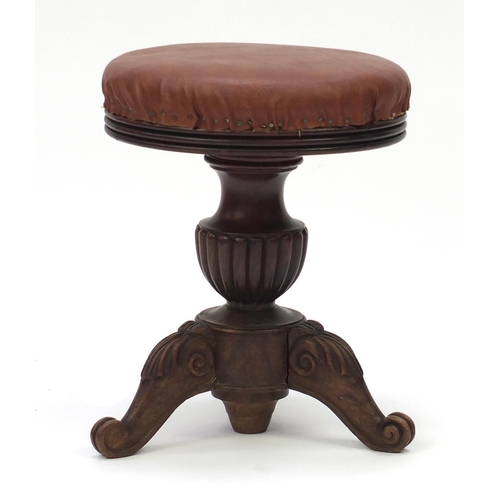 2071 - Victorian carved mahogany adjustable piano stool, with brown leather top and scroll feet, 48cm high