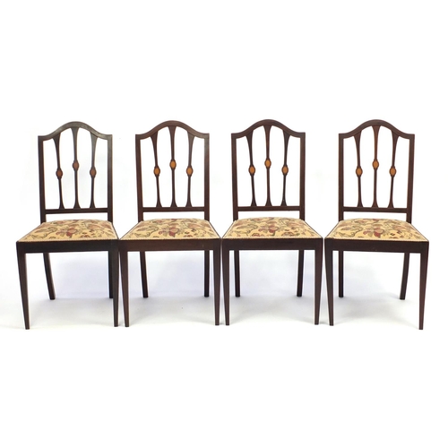 2118 - Set of six Edwardian inlaid mahogany dining chairs including a carver, with floral upholstered seats... 